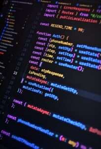Vibrant JavaScript code on a screen showcasing front-end development with syntax highlighting.